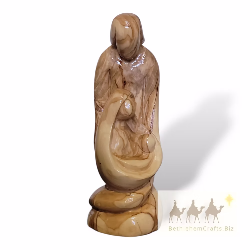 Hand-carved olive-wood Holy Family sculpture showing Joseph, Mary, and the infant Jesus